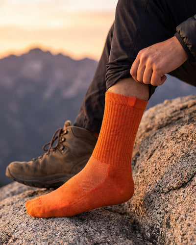 Bulg 788 Bali Orange crew socks worn outdoors adding a bold pop of color