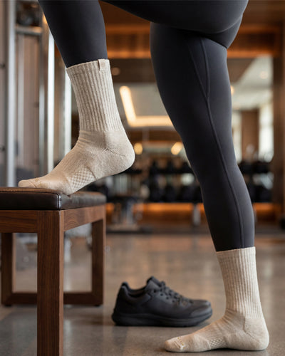 Bulg 788 Bleached Nature crew socks in athletic use showing soft oat marl ribbed cushioning