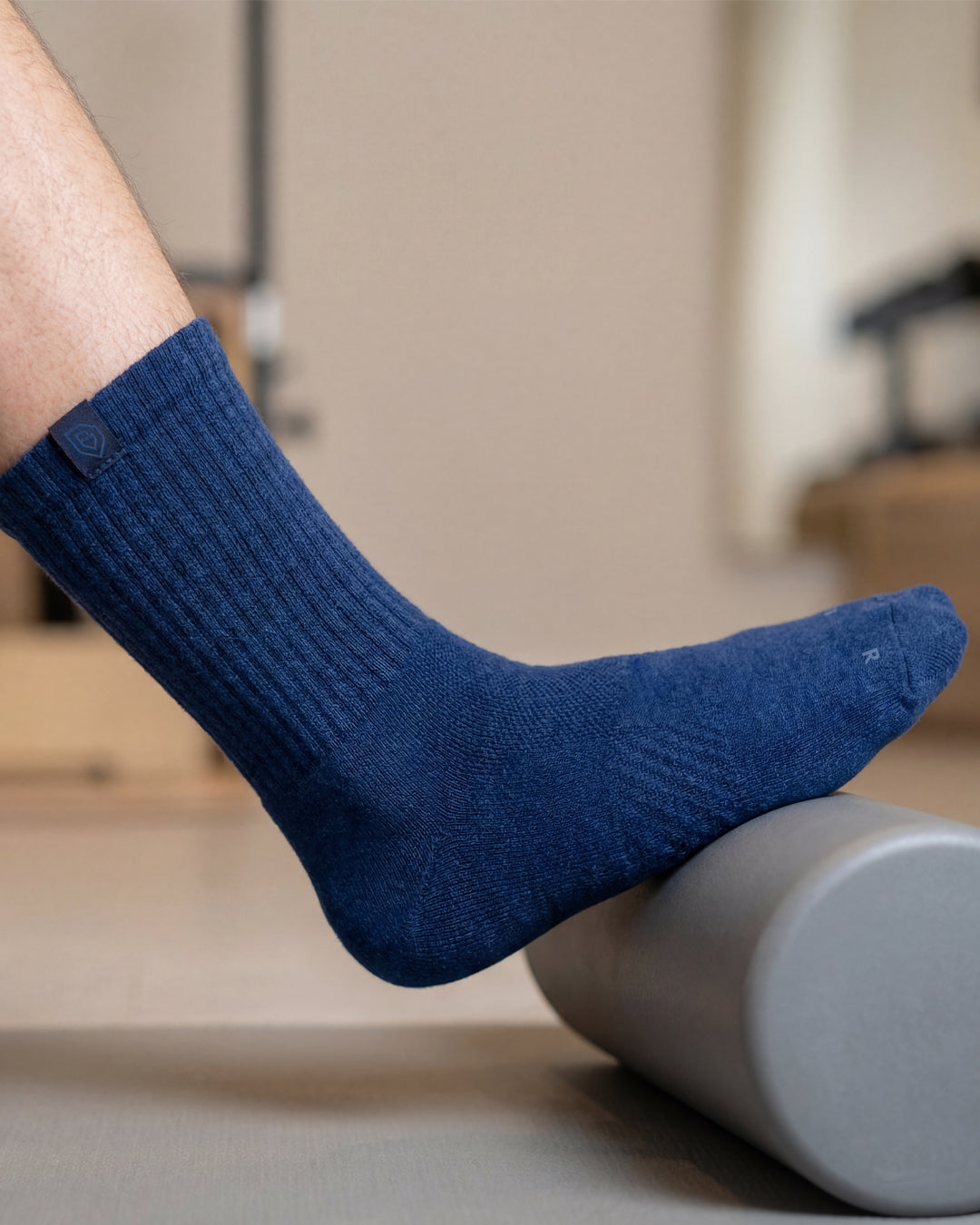 Bulg 788 Blue Bond crew socks in athletic use with deep navy ribbed cushioning