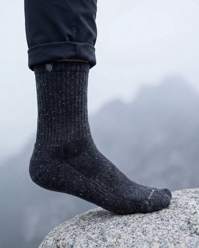 Bulg 788 Charcoal White Berry crew socks worn outdoors with subtle speckled texture