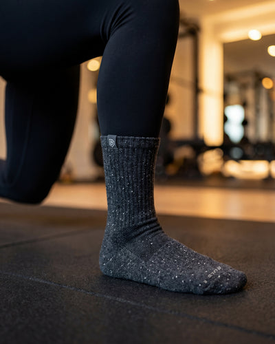 Bulg 788 Charcoal White Berry crew socks in athletic use with speckled donegal knit cushioning