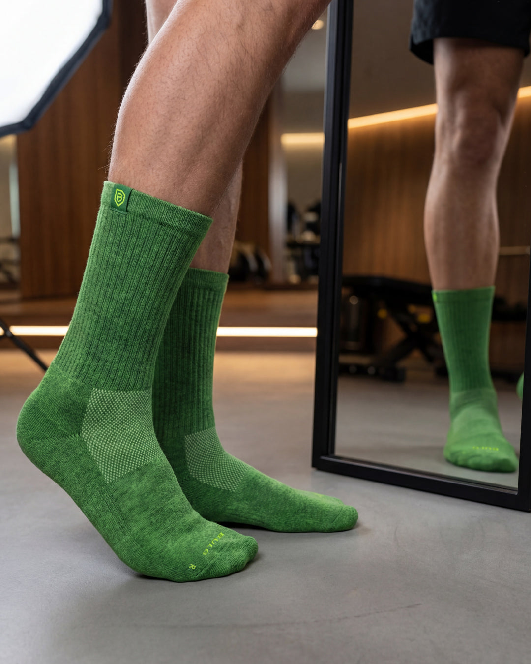 Bulg 788 Dormen crew socks in athletic use with vivid kelly green ribbed cushioning
