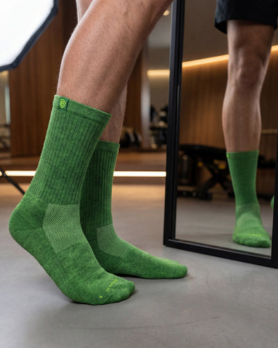 Bulg 788 Dormen crew socks in athletic use with vivid kelly green ribbed cushioning