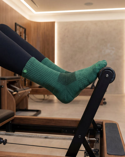 Bulg 788 Esmeralda crew socks in athletic use with jewel forest green ribbed cushioning