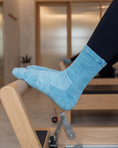 Bulg 788 Goshima crew socks in athletic use with dusty sky blue ribbed cushioning