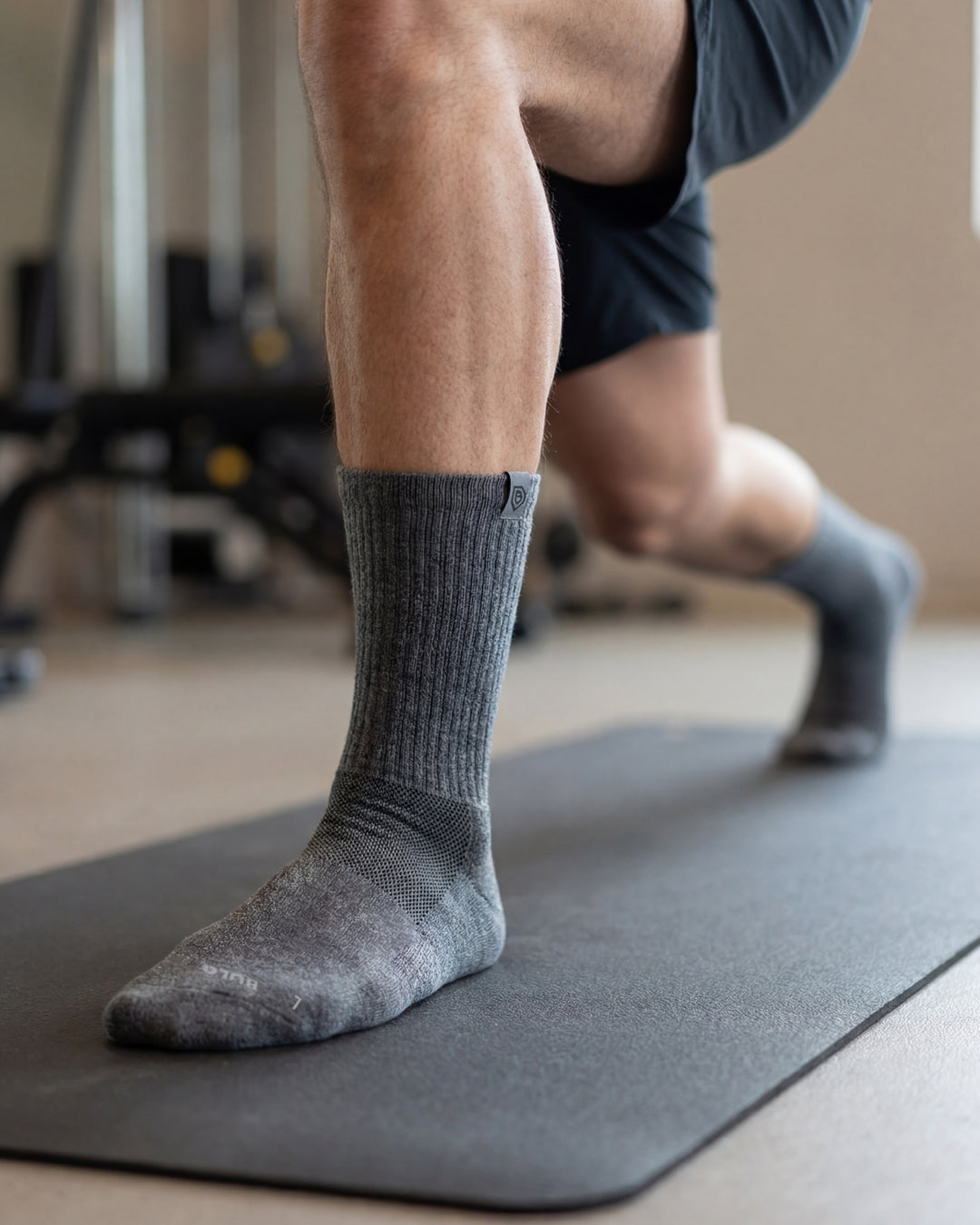 Bulg 788 Laden Grey crew socks in athletic use with mid heather grey ribbed cushioning