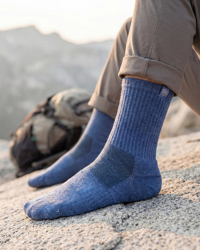 Bulg 788 Quamash crew socks worn outdoors with a muted denim blue palette