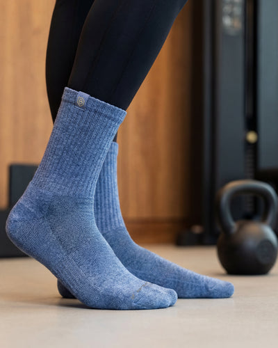 Bulg 788 Quamash crew socks in athletic use with muted denim blue ribbed cushioning