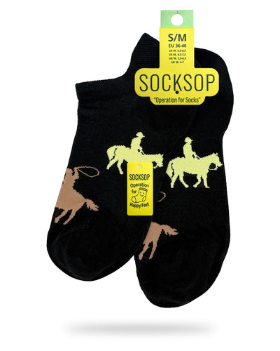 Socksop Cowboy ankle socks — studio hero shot black pair with yellow horseback riders and lasso