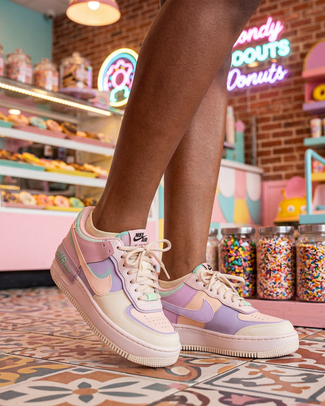 Socksop Donut ankle socks lifestyle shot — cream pair styled with playful dessert-themed outfit