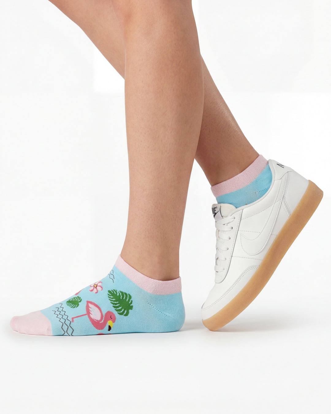 Socksop Flamingo ankle socks studio shot — turquoise pair with pink flamingos and monstera leaves
