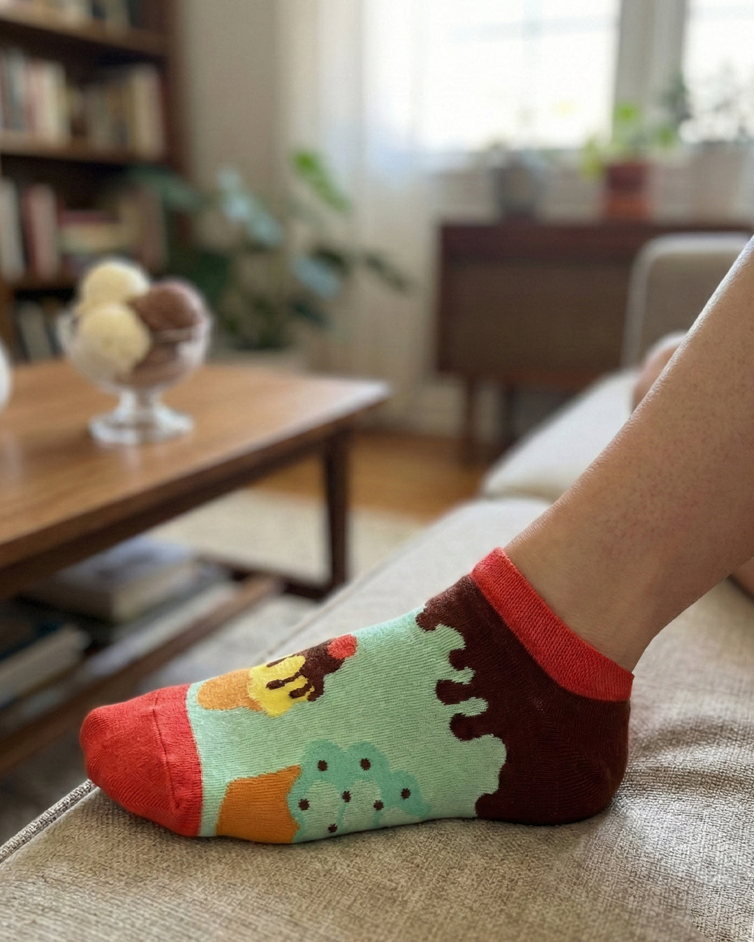 Socksop Ice Cream ankle socks at home — mint pair styled with sweet dessert indoor cue