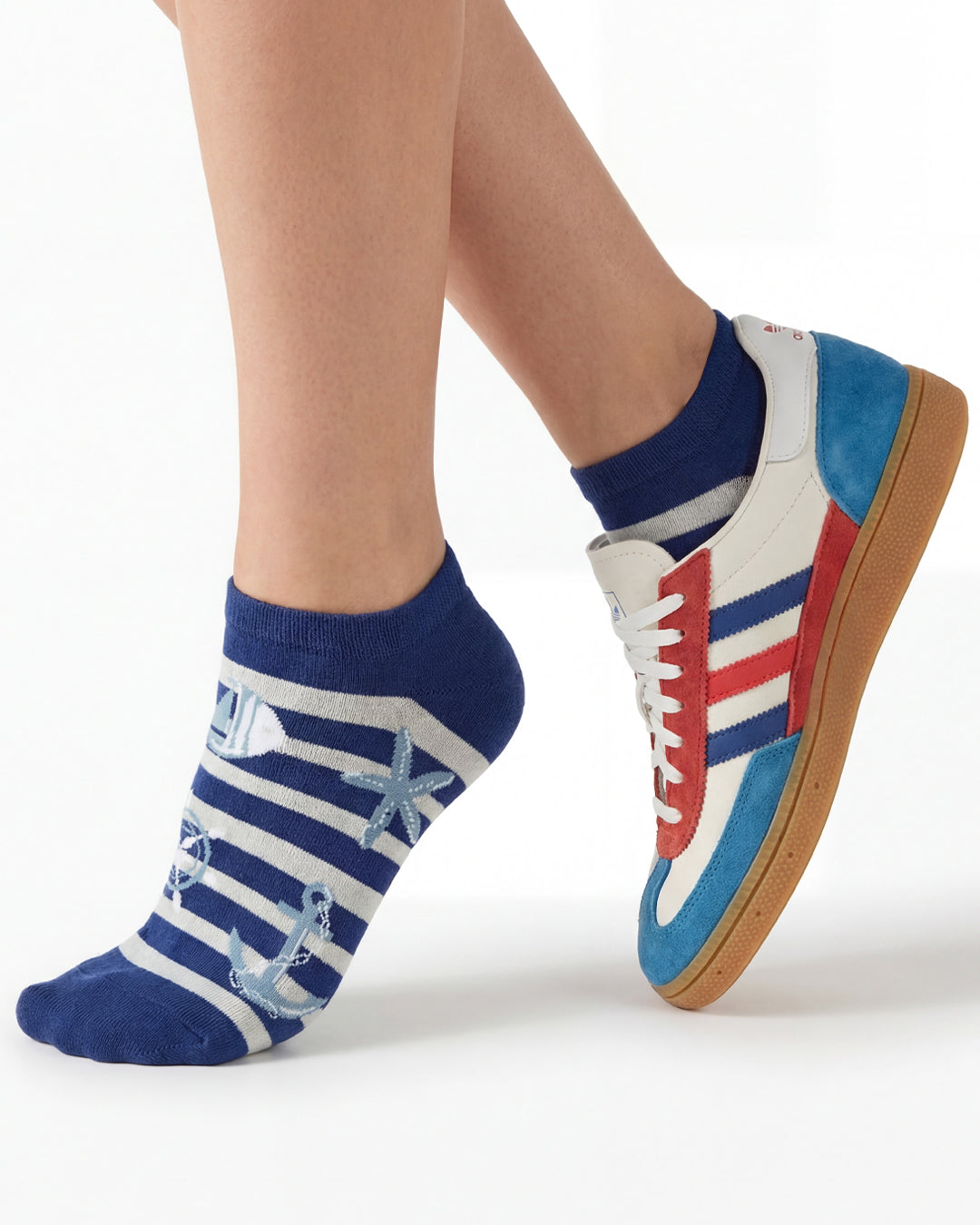 Socksop Nautical ankle socks studio shot — navy striped pair with anchors starfish and ships wheel
