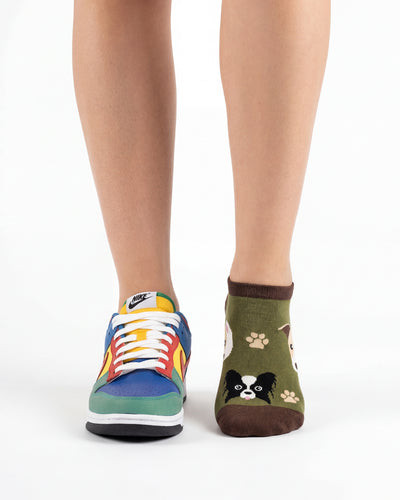 Socksop Paw ankle socks studio shot — olive pair with cute dog faces and paw prints