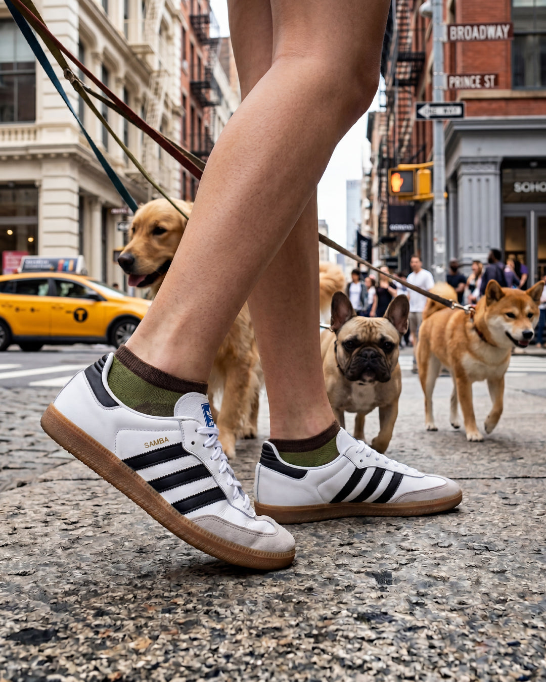 Socksop Paw ankle socks lifestyle shot — olive pair styled with playful pet-owner outfit
