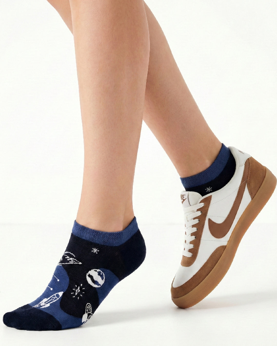 Socksop Space ankle socks studio shot — navy pair with planets rockets and white constellations