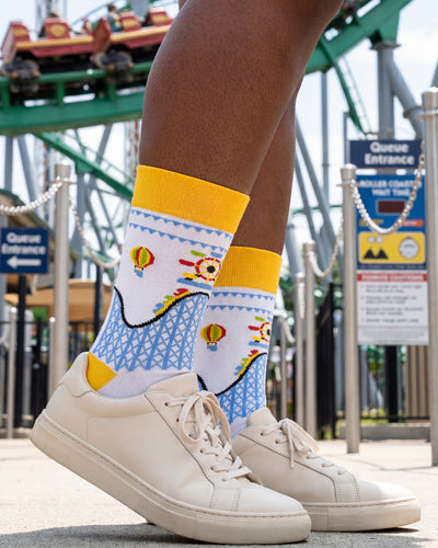 Socksop Amusement Park crew socks close-up — knit detail of Ferris wheel and hot-air balloon icons