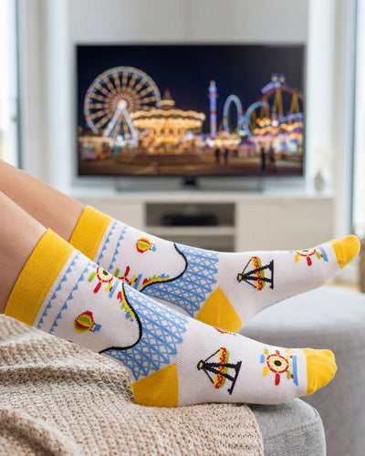 Socksop Amusement Park crew socks at home — playful carnival-pattern styling for casual indoor wear
