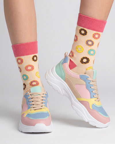Socksop Donut crew socks studio shot — pastel sprinkled donuts on cream cotton