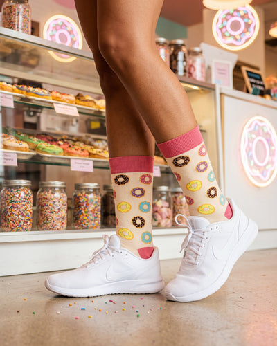 Socksop Donut crew socks lifestyle shot — pastel donut design styled for cafe-friendly everyday wear