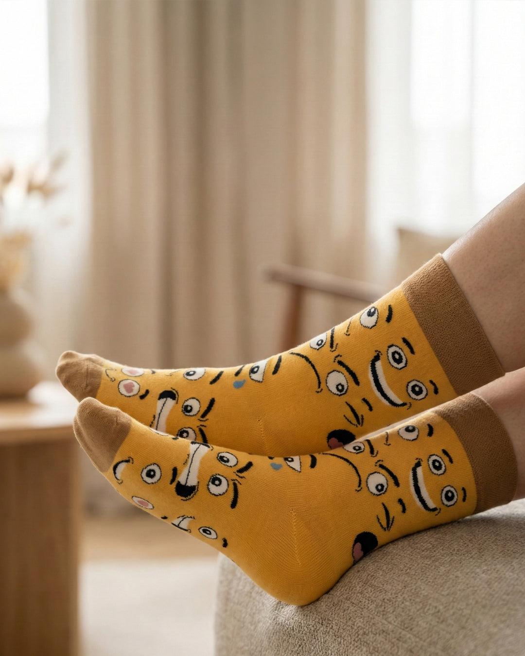 Socksop Emoji crew socks at home — cheerful emoji-pattern styling for casual indoor wear