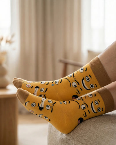 Socksop Emoji crew socks at home — cheerful emoji-pattern styling for casual indoor wear