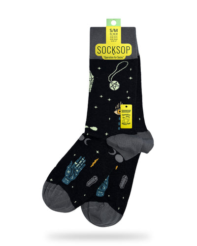 Socksop Esoteric Element crew socks — studio hero shot with mystical pentagram eye and celestial icons on black