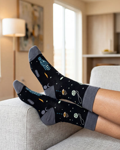 Socksop Esoteric Element crew socks at home — witchy occult-pattern styling for cozy indoor wear