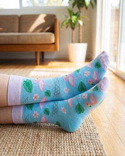 Socksop Flamingo crew socks at home — tropical-pattern styling for breezy indoor wear