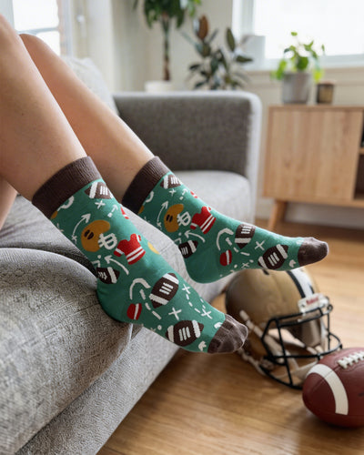 Socksop Football crew socks at home — gameday-themed styling for casual indoor wear