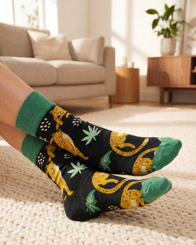 Socksop Forest crew socks at home — wild jungle-pattern styling for cozy indoor wear