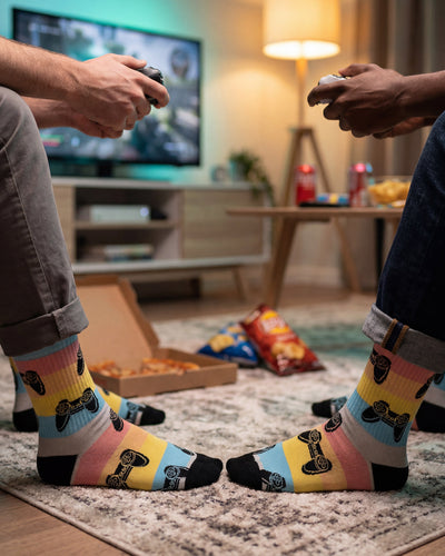 Socksop Gamer crew socks at home — retro arcade-pattern styling for cozy indoor wear