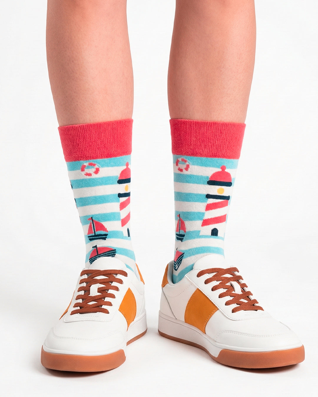 Socksop Lighthouse crew socks studio shot — turquoise stripes with red lighthouse motifs