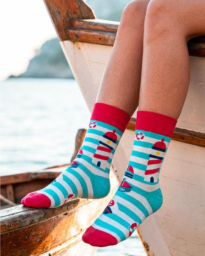 Socksop Lighthouse crew socks at home — coastal stripes styled for relaxed indoor wear
