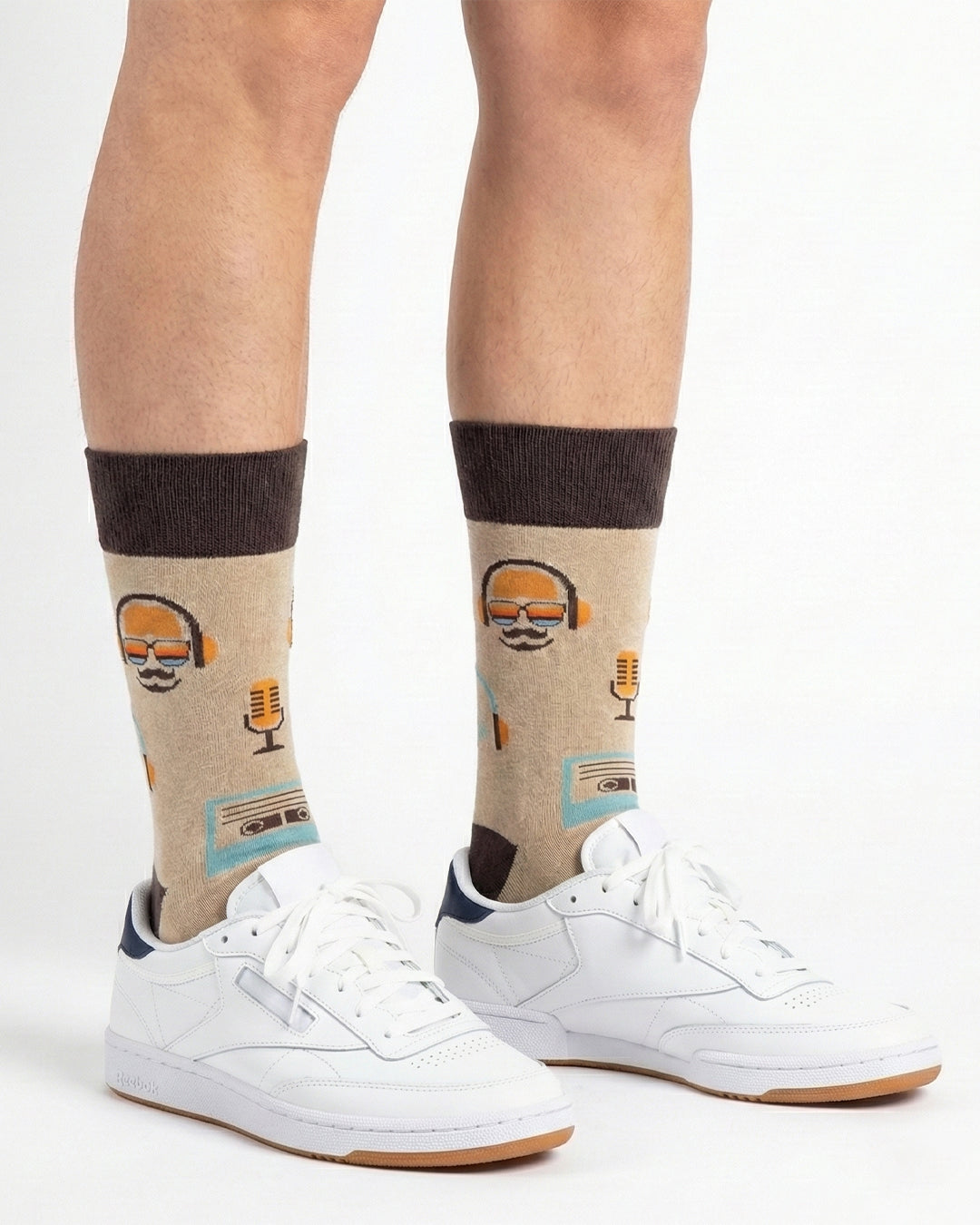 Socksop Music crew socks studio shot — beige with retro headphones and cassette icons