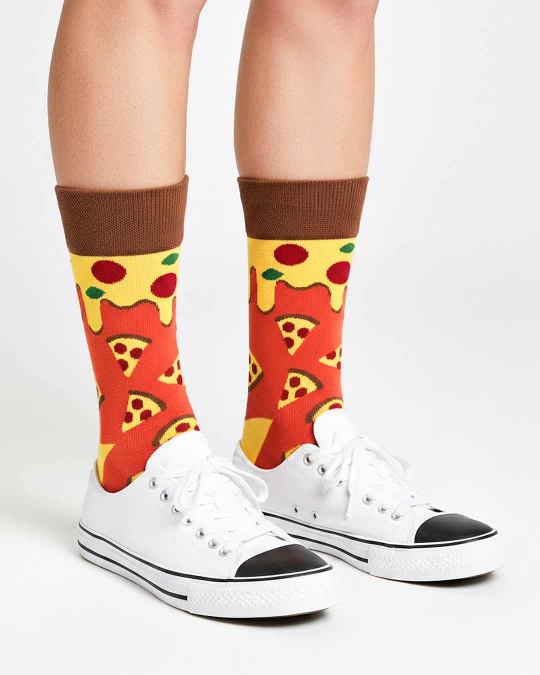 Socksop Pizza crew socks studio shot — orange red with pepperoni slice motifs