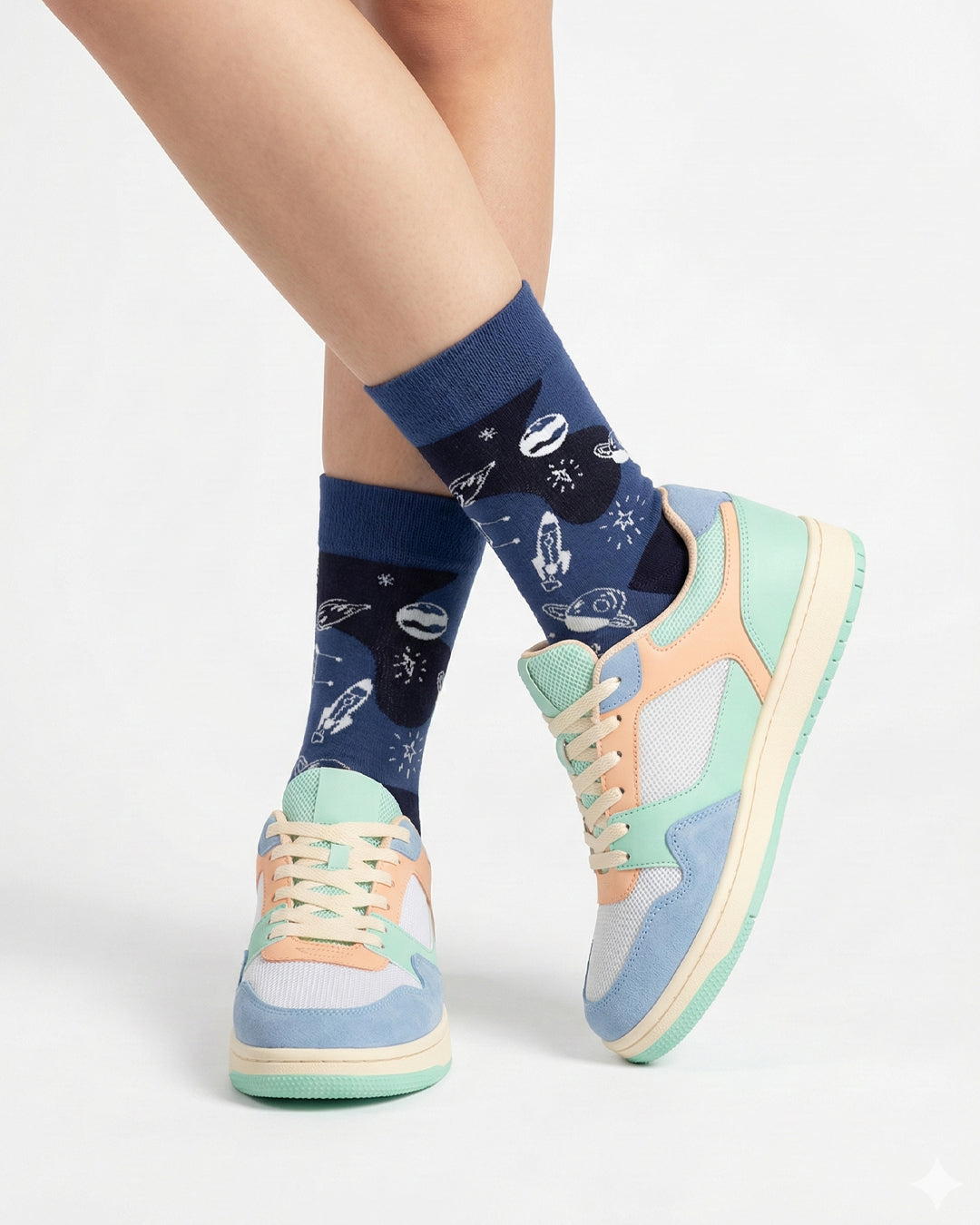 Socksop Space crew socks studio shot — navy with rockets and constellation motifs