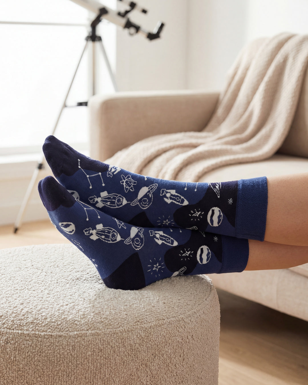 Socksop Space crew socks at home — cosmic rocket print styled for cozy indoor wear