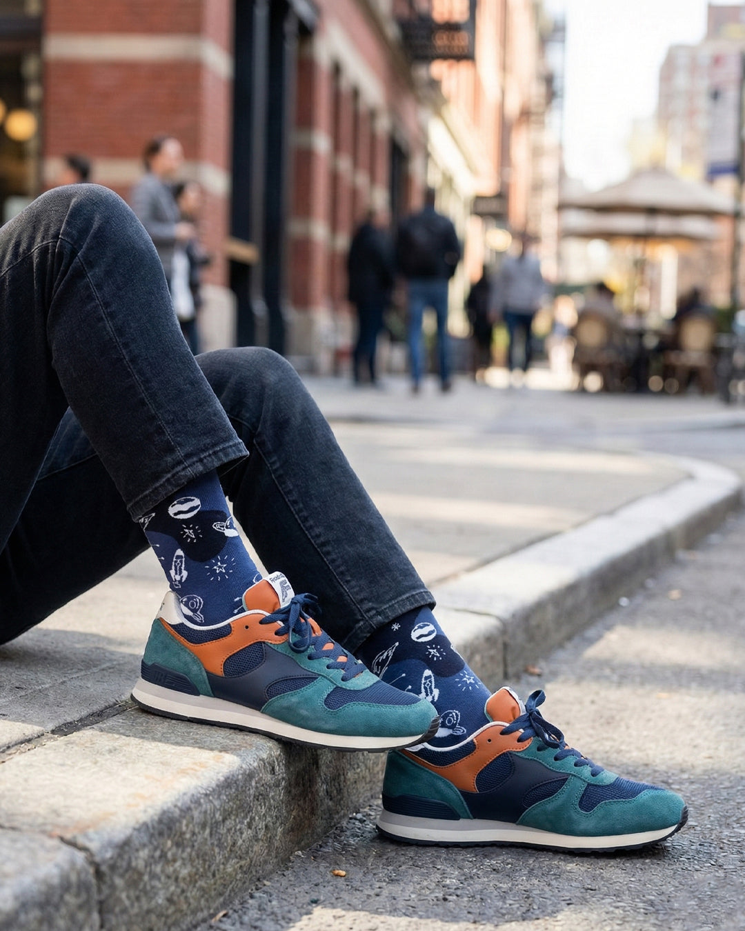 Socksop Space crew socks worn outdoors — outer space pattern in everyday setting