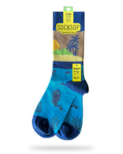 Socksop Summer crew socks — studio hero shot tropical sunset palm tree top with underwater scene foot