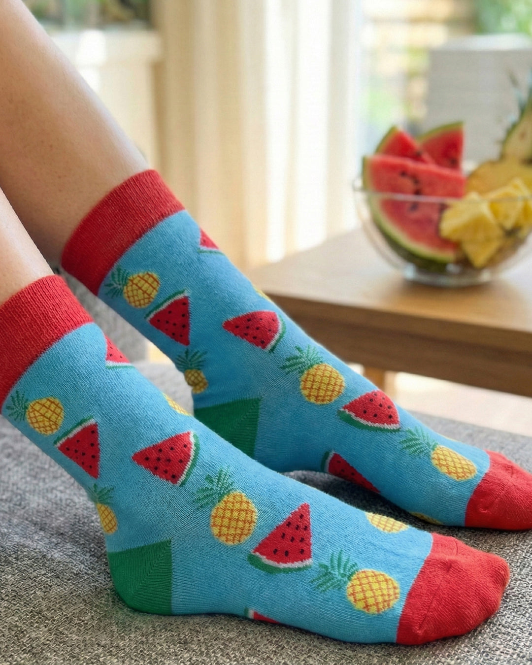 Socksop Watermelon crew socks at home — tropical fruit print styled for indoor lounging